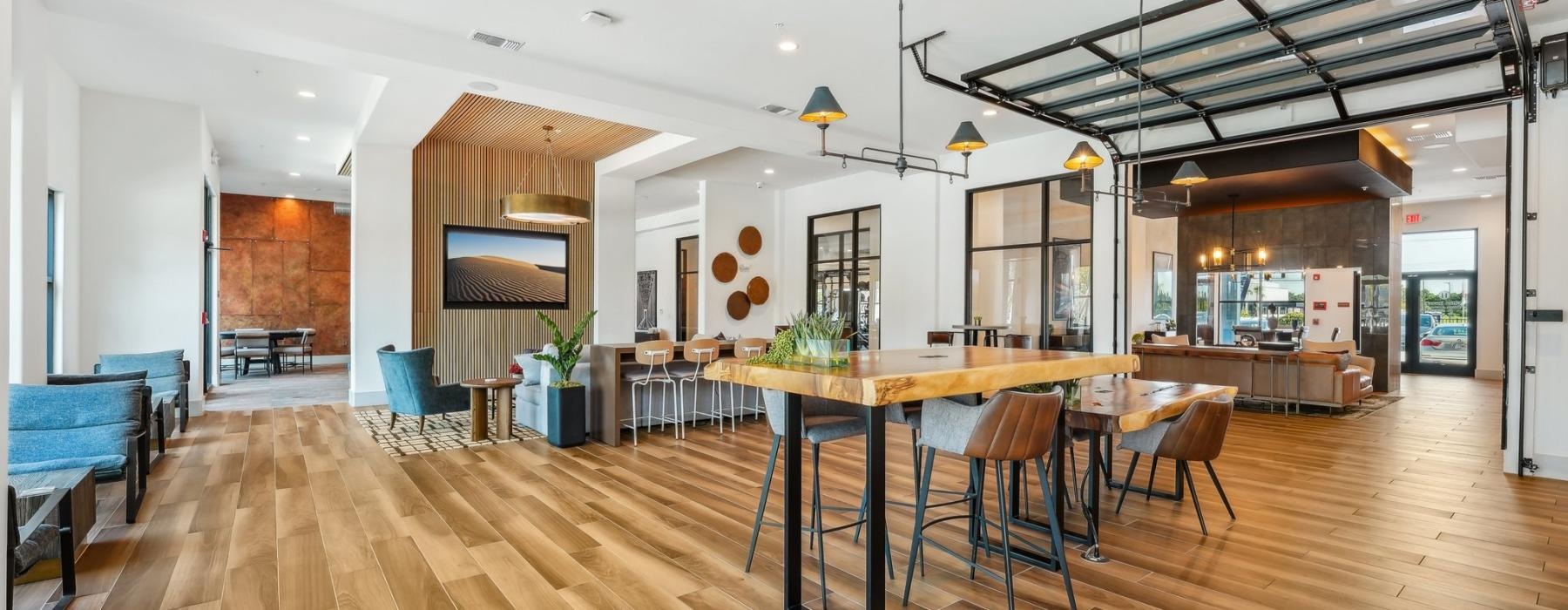 a large room with a wood floor and a wood floor