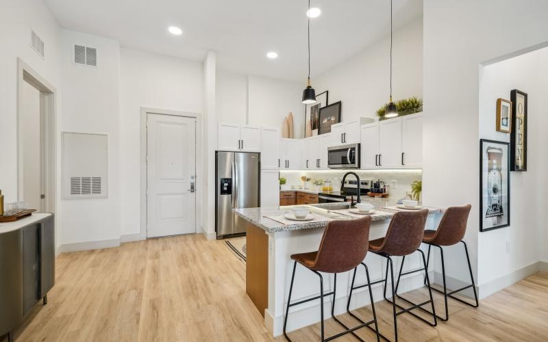 a kitchen with a dining table