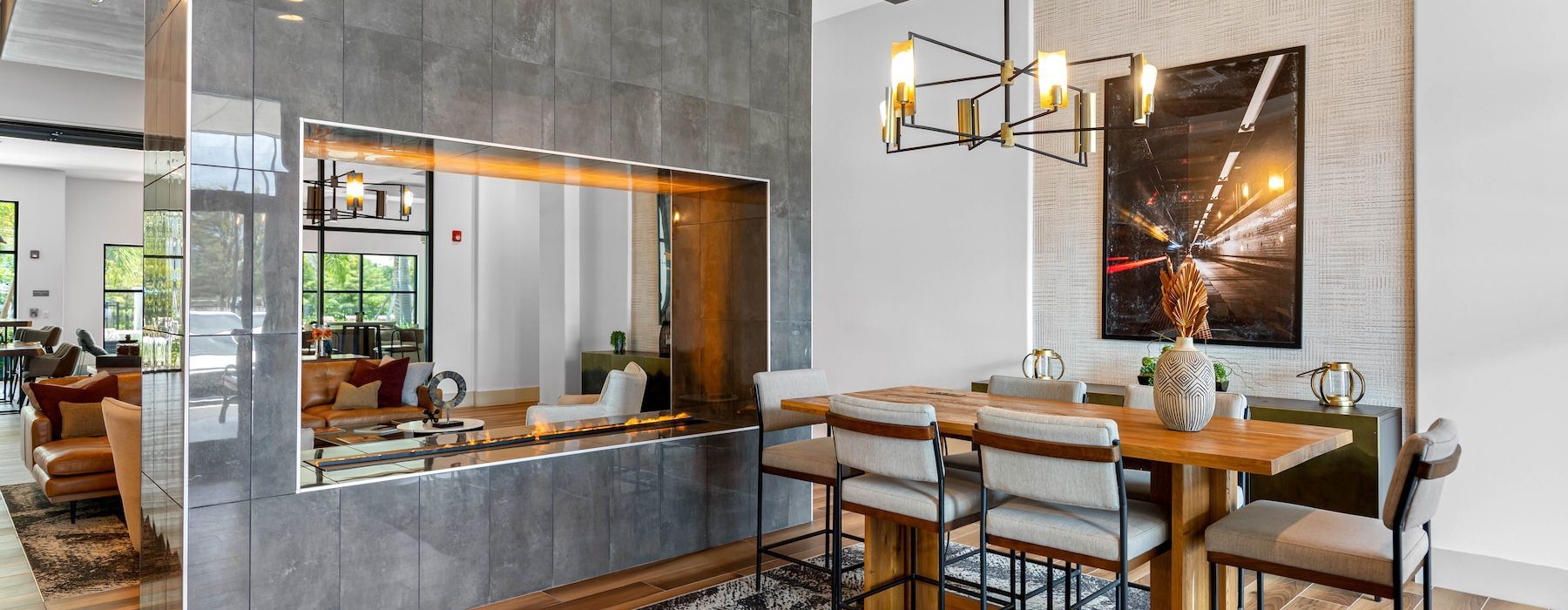 a room with a table and chairs