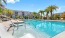 pool with lounge chairs