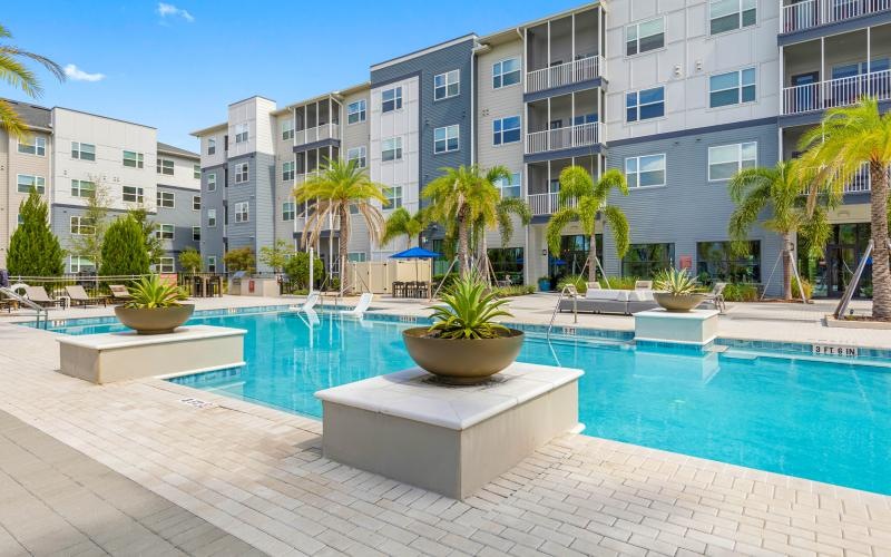 a pool in front of a building
